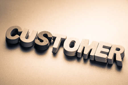 Stack wood letters as Customer wordの写真素材