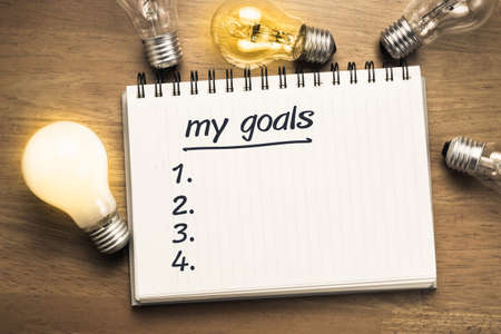 My Goals as memo on notebook with many light bulbsの写真素材