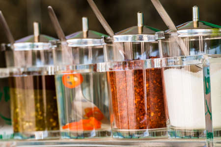 Various common condiments of Thai food or noodleの写真素材