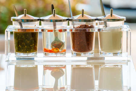 Various common condiments of Thai food or noodleの写真素材