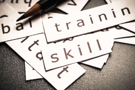 Closeup piece of paper pile at Skill wordの写真素材