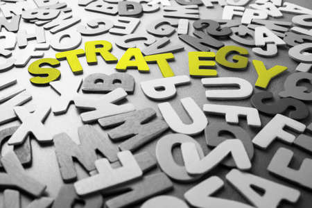 Color Strategy word in scattered black and white wood lettersの写真素材