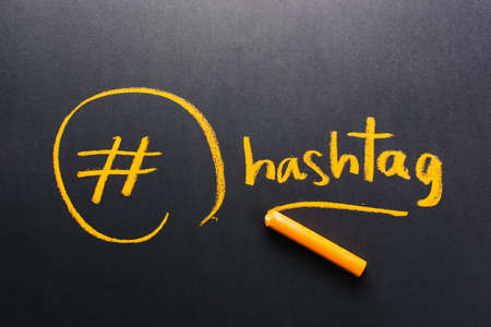 Handwriting of Hashtag symbol on chalkboardの写真素材
