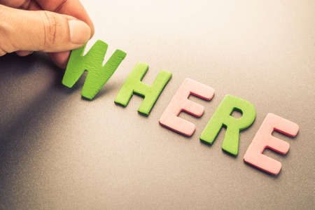 Hand arrange wood letters as Where wordの写真素材