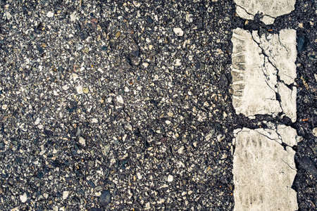 Closeup asphalt road with white line as abstract backgroundの写真素材