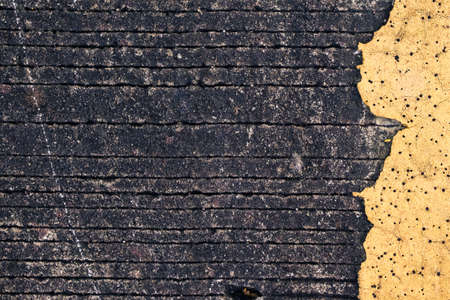 Abstract background of cement road with part of decay yellow line