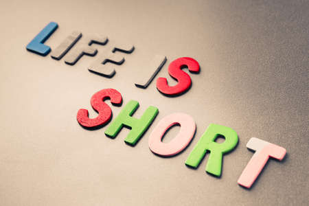 Life is Short text arranged by wood lettersの写真素材