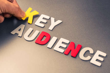 Hand arrange wood letters as Key Audience wordの写真素材