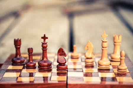 Closeup wood knight chess on chess game boardの写真素材