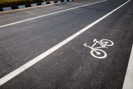 Bicycle lane on asphalt roadの写真素材