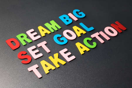 Dream Big - Set Goal - Take Action in colorful wood lettersの写真素材
