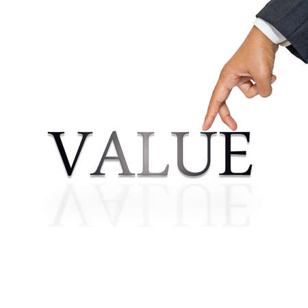 Businessman's hand as finger walking on Value word
