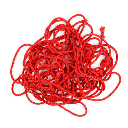Pile of single red rope isolated on white background
