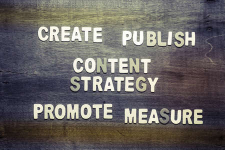 Content Strategy concept arranged with wood letters on wood textureの写真素材