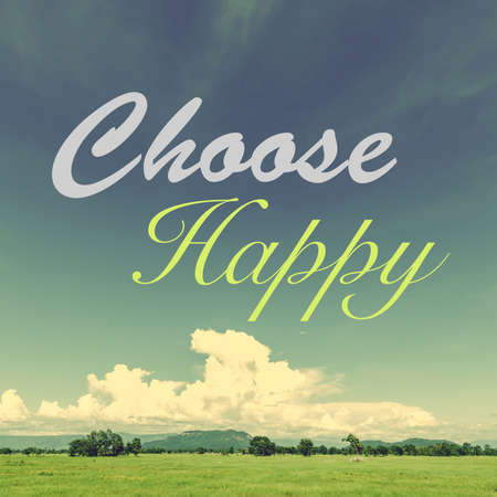 Inspiration quote (Choose Happy) on vintage photo, clear sky over the fieldの写真素材