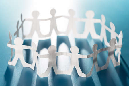 Human chain paper in circle formの写真素材