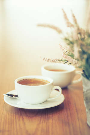 Cup of black cofffee on wood table with copy space, morning coffeeの写真素材