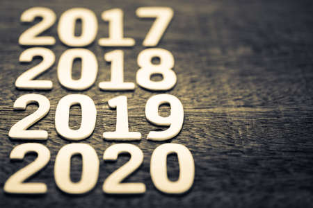 2019 in running year numbers on wood backgroundの写真素材
