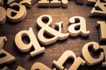 Question and Answer, q and a by wood letters on wood background
