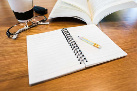Small notebook with pencil, prepare to take a note from reading to create new writingの写真素材