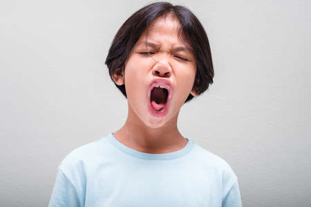 Nine years old girl is shouting with pressure or angry, behavior management of childrenの写真素材