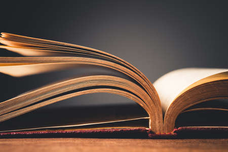 Closeup hardcover old book on the tableの写真素材