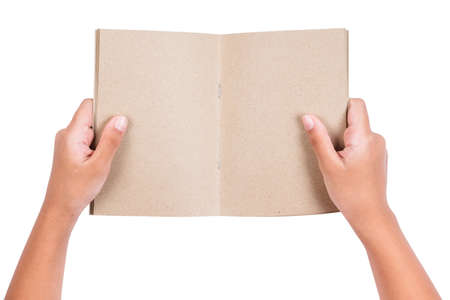 Child's arm opend the recycled notebook isolated on white backgroundの写真素材