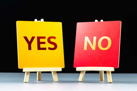 YES and No answer on two tripod easels for voting concept