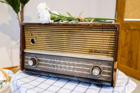 Retro portable radio in the living room, outdate radio boombox become a decoration object in modern houseの写真素材