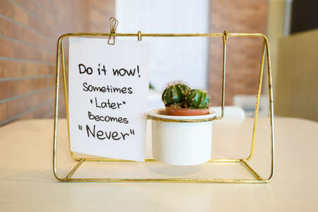 Inspiration quote; Do it now Sometimes Later becomes Never, printed on paper with the designed plant...