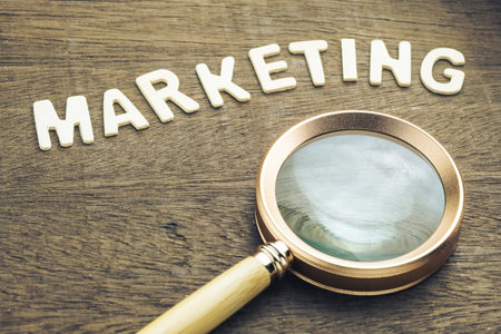 Marketing analysis, marketing word by wood letters with magnifying glassの写真素材