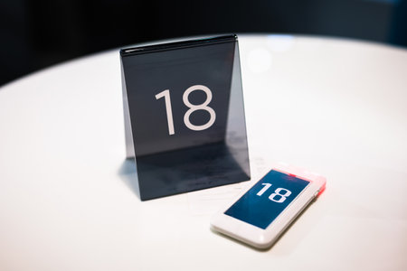 Table number sign with customer buzzer, beep sound and vibration wireless device, or calling queue...