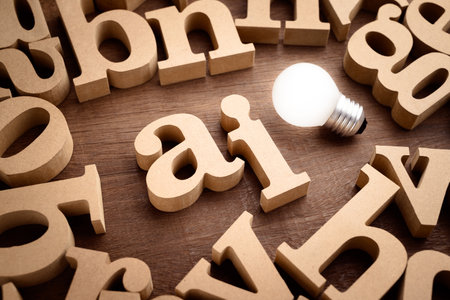 Wooden English alphabets with AI in the middle, with a glowing light bulb as a symbolic of an old school success being a light source, knowledge about AI or Artificial Intelligenceの写真素材