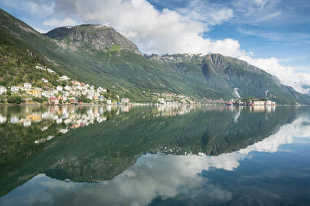 Odda Town with small houses on a Fjord in Summer, Norwayの写真素材