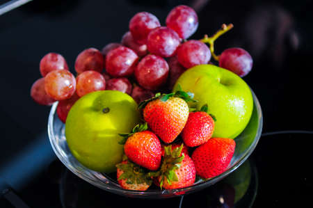 Various fruits - grapes, apple, strawberry の写真素材