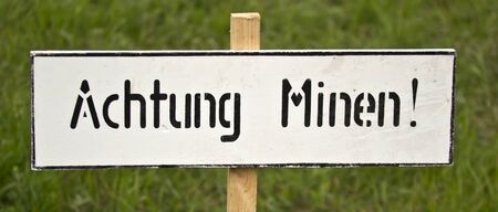 plaque on the green background of grass gently minesの写真素材