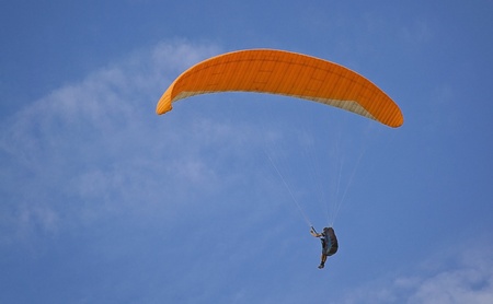 parachutist against the blue skyの写真素材