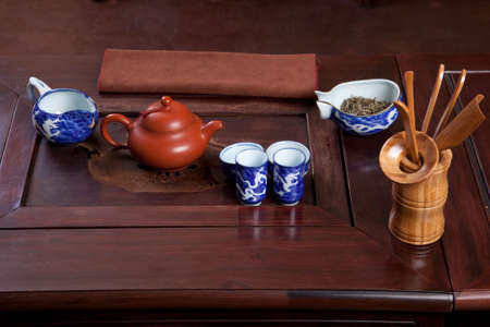 Teapot and tea cup in a traditional chinese tea houseの写真素材