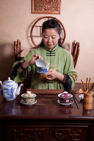 Attractive woman inside a traditional tea houseの写真素材