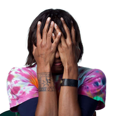 A scared african american womanの写真素材