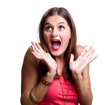 Excited young woman looking away from the camera