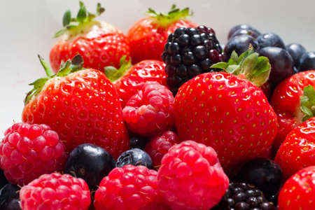 Fresh fruit close up of strawberries and raspberries