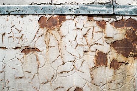 cracked painting on iron plateの写真素材