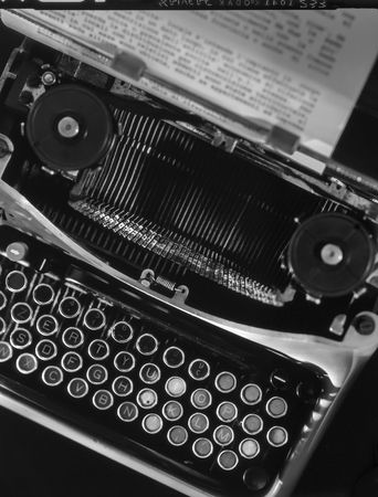 old analog slide scanned of a typewriter detail with paper sheetの写真素材