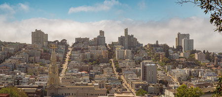 Panorama of San Francisco with the fog, behind the buildings, on the way, San Francisco, California,...