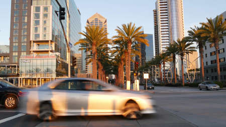 SAN DIEGO, CALIFORNIA USA - 13 FEB 2020: Pedestrians, traffic and highrise buildings in city...