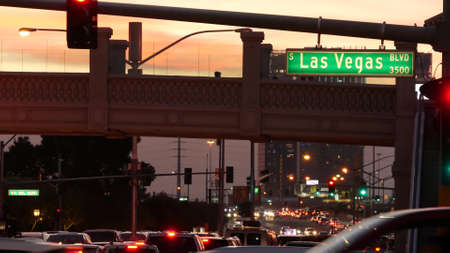 LAS VEGAS, NEVADA USA - DEC 13, 2019: Traffic sign glowing on The Strip in fabulous sin city. Iconic...