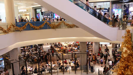 BANGKOK, THAILAND - 18 DECEMBER, 2018: Siam Paragon asian shopping mall interior. Crowds of people...