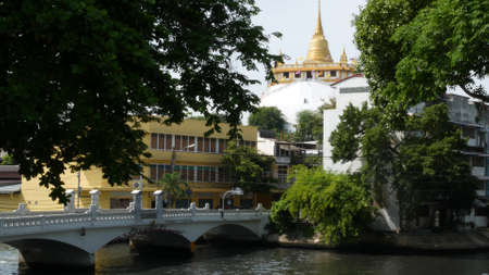 BANGKOK, THAILAND, 11 JULY 2019: Canal as classic typical water way for public passengers transportation. Street city life on khlong. Local people use boat as traditional transport during traffic jam.のeditorial素材