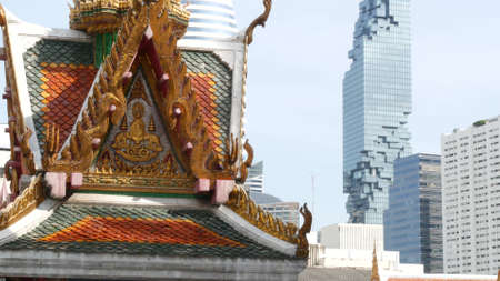 BANGKOK, THAILAND - JULY 13, 2019: Conceptual contrast of oriental old traditional ancient temple...